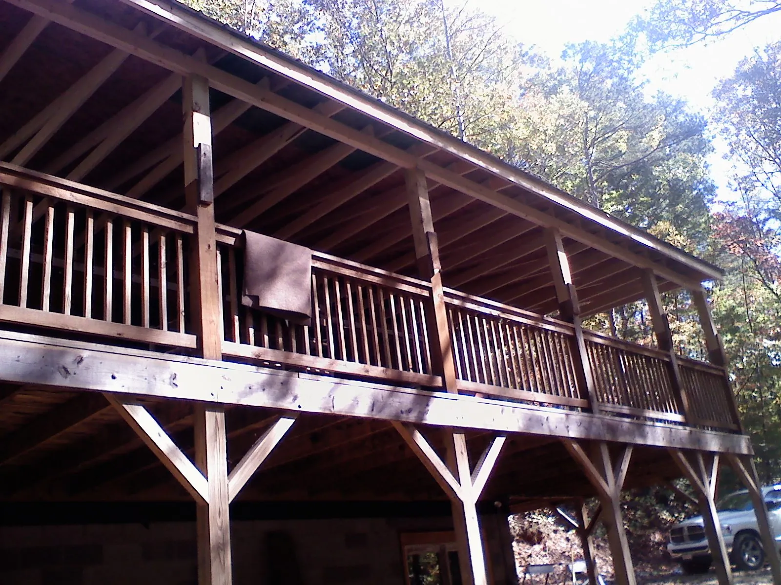 Timber framing under a new elevated porch and deck — Roof Leak Repair in Porum by Roofing Brothers
